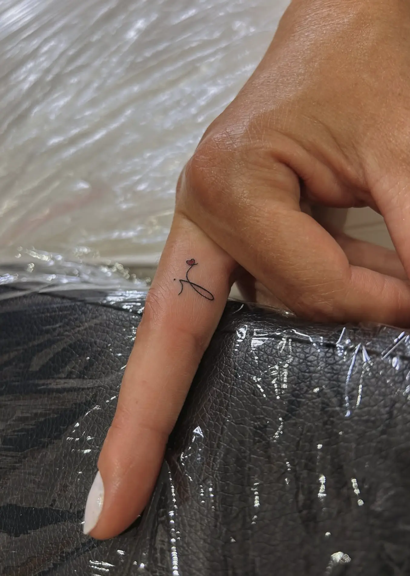 fine line heart tattoo